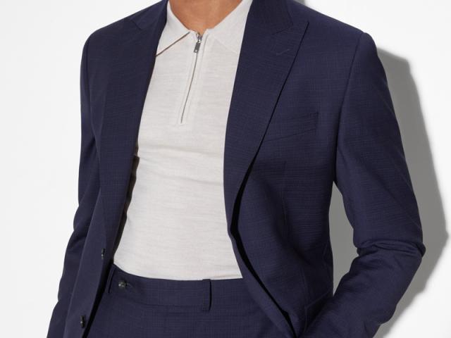 a man wearing a suit and tie