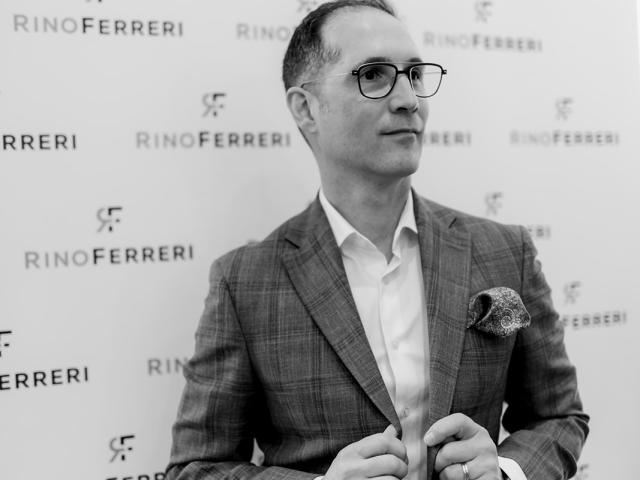 a man wearing a suit and tie