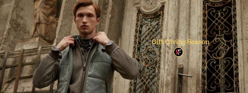 a person wearing a suit and tie