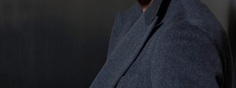 a man wearing a suit and tie