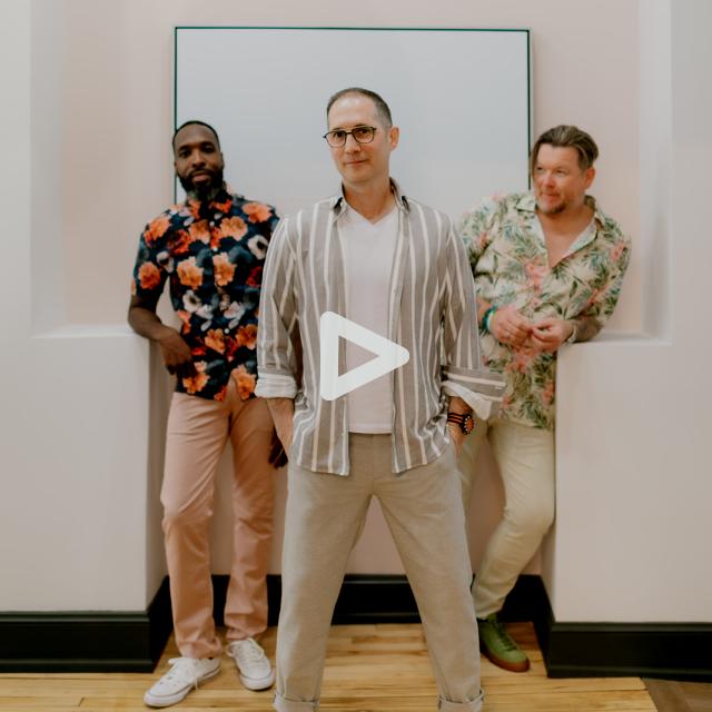 a group of people posing for the camera