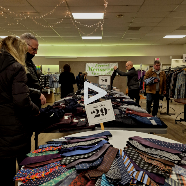 a group of people standing in a room