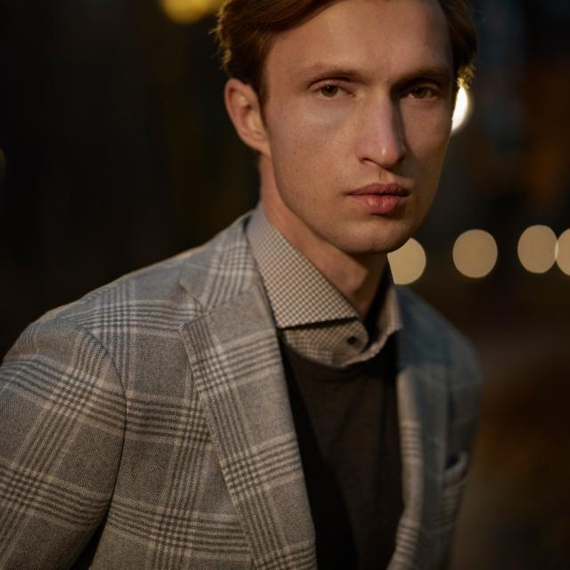 a man wearing a suit and tie