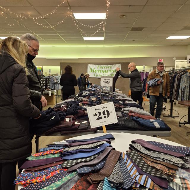a group of people standing in a room